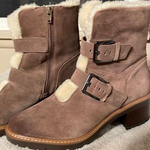 Boots size 8.5 warm and cozy.  Brand new.